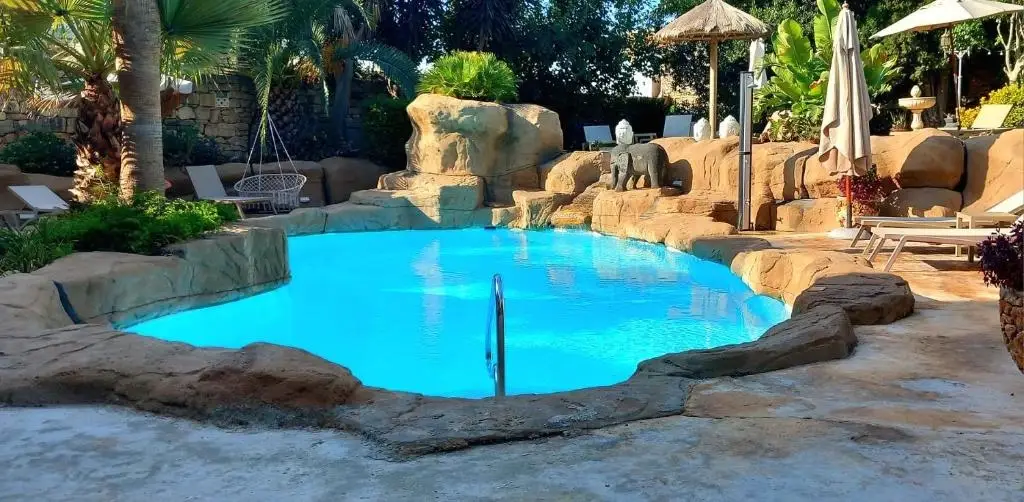 The Red Farm pool and garden